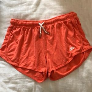 Nike faded orange shorts